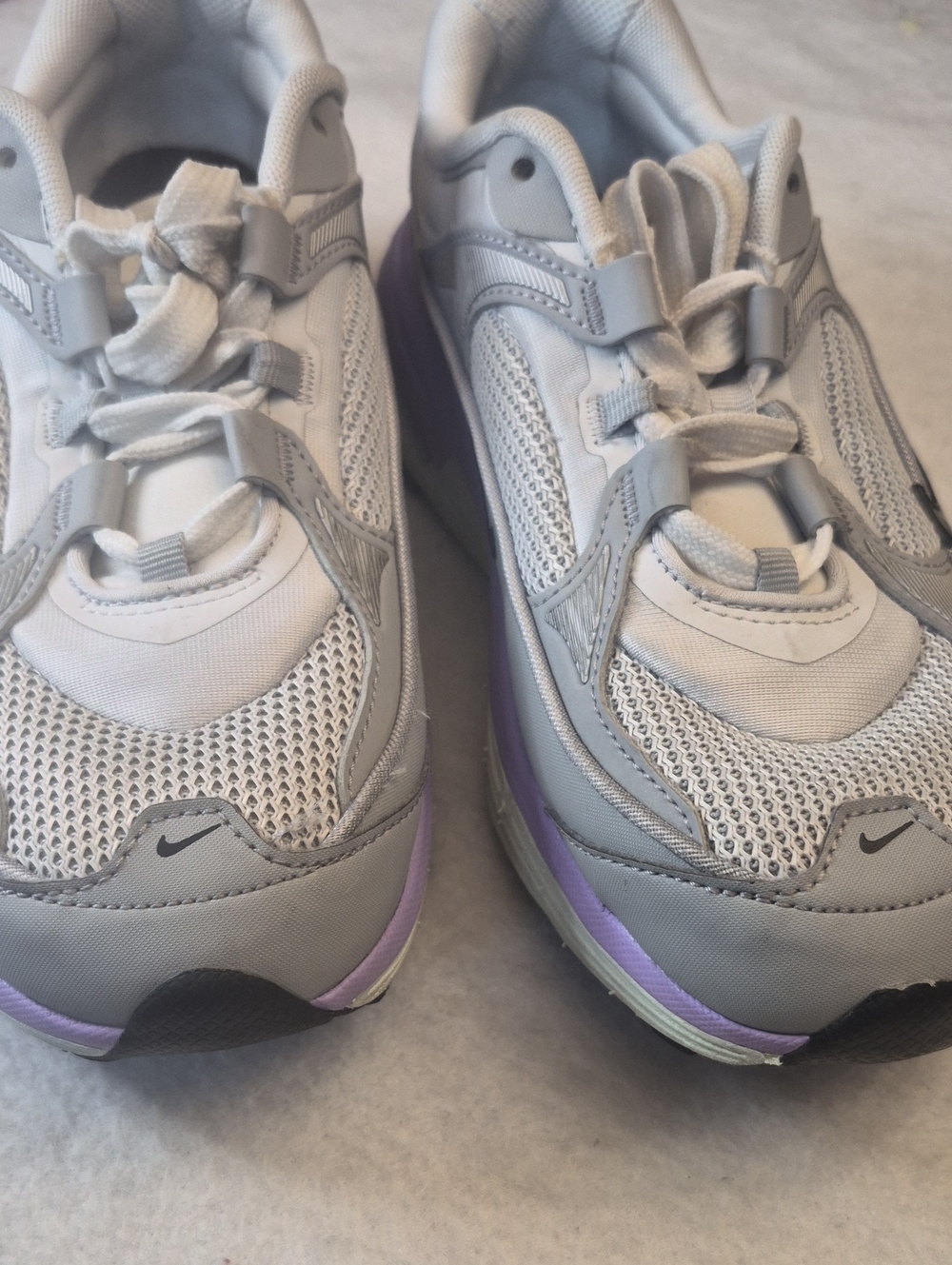 Nike Women’s Light Gray Sneakers with Lavender Trim